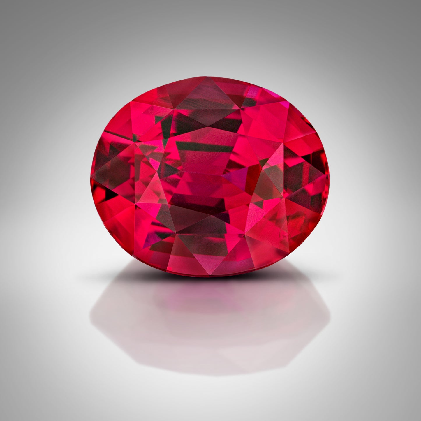 Ruby Surrounded by Diamonds and Set in a Hand Fabricated Platinum ring.