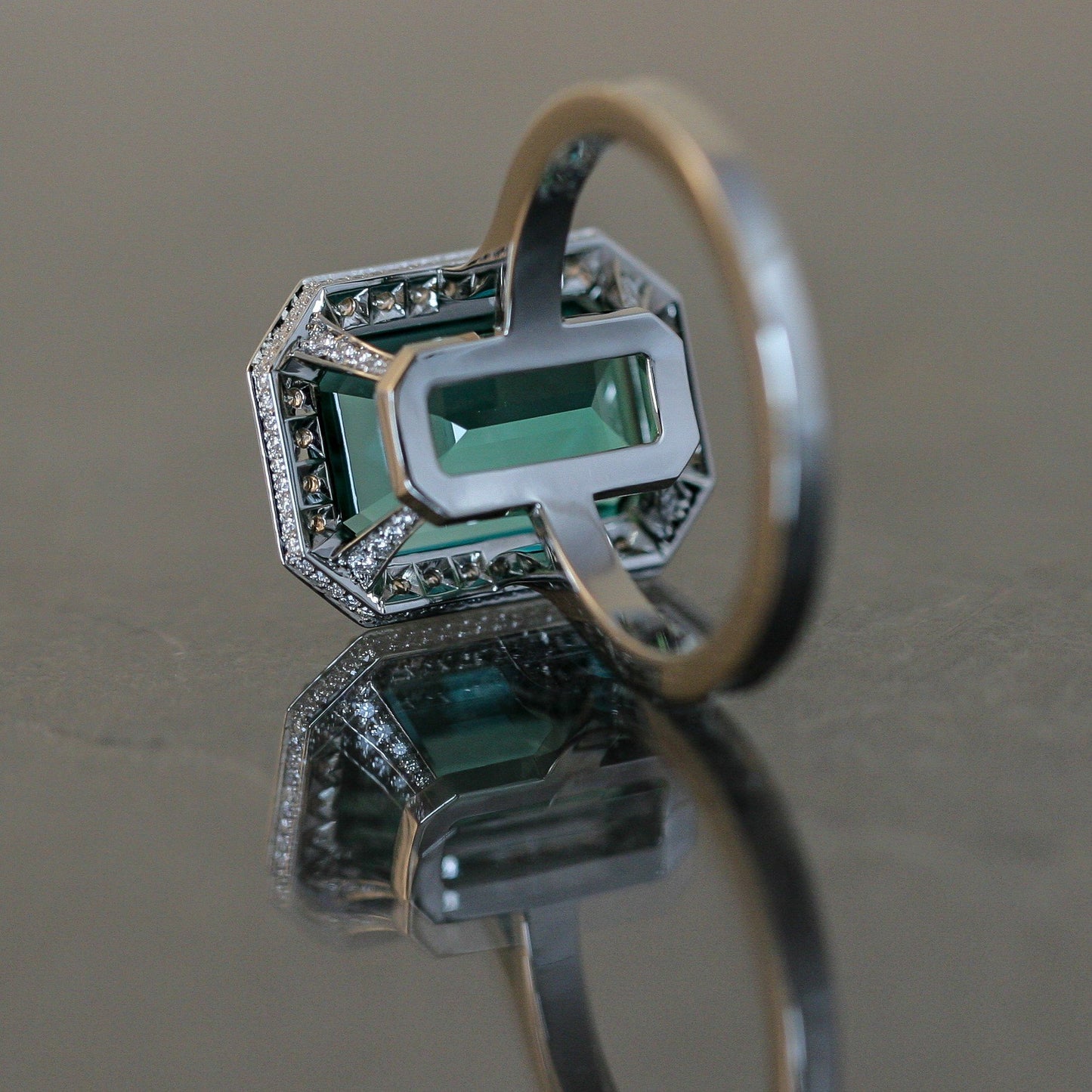 Lagoon Tourmaline Ring Set in Platinum with Diamond Accents.