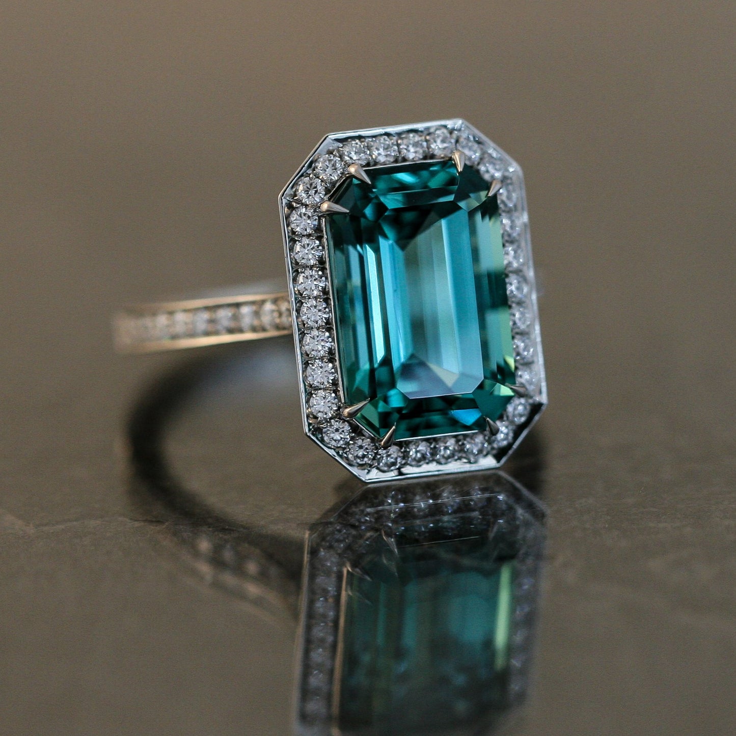 Lagoon Tourmaline Ring Set in Platinum with Diamond Accents.