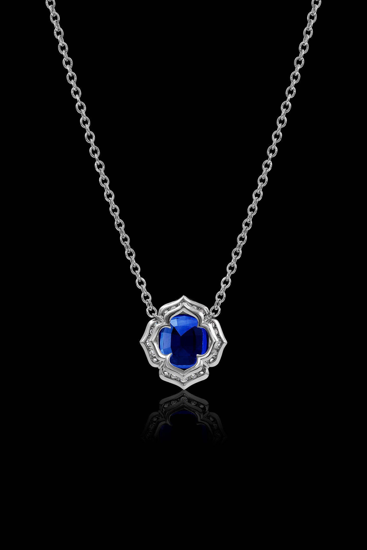 Blue Sapphire Flower Pendant Set in Platinum & Accented with Diamonds