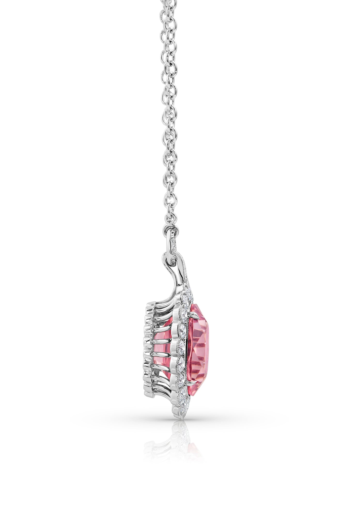 Pink Garnet Pendant Surrounded by  Platinum and Ideal Cut Diamonds.