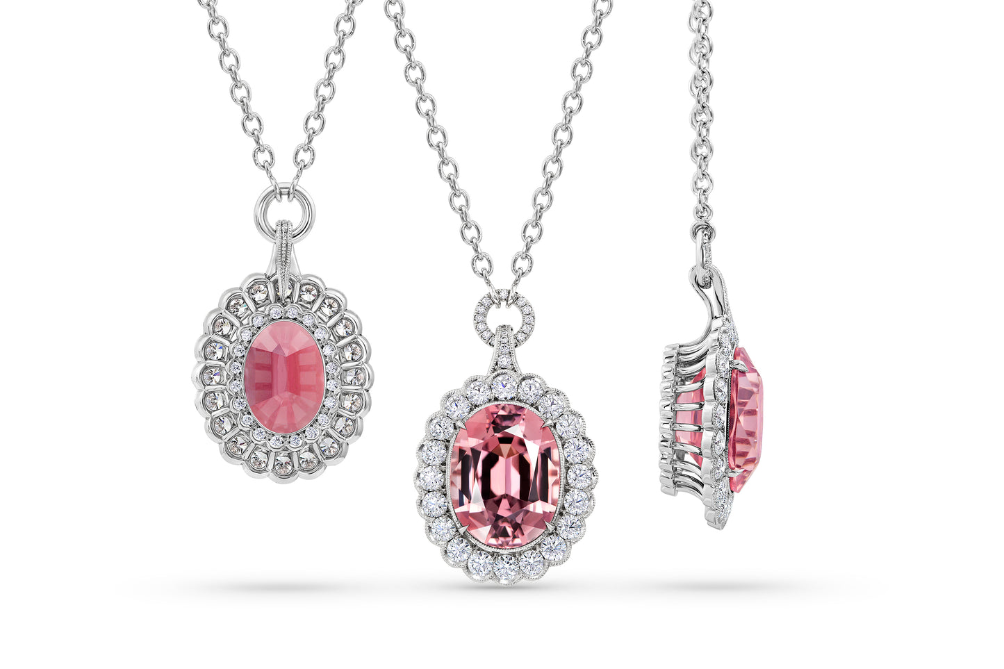 Pink Garnet Pendant Surrounded by  Platinum and Ideal Cut Diamonds.