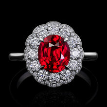 Load image into Gallery viewer, Ruby Surrounded by Diamonds and Set in a Hand Fabricated Platinum ring.
