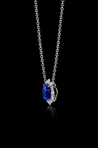 Blue Sapphire Flower Pendant Set in Platinum & Accented with Diamonds