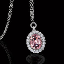 Load image into Gallery viewer, Pink Garnet Pendant Surrounded by  Platinum and Ideal Cut Diamonds.